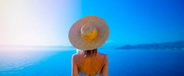 Girl In Hat And Dress With Sea Coastline Girl In Hat And Dress With Sea Coastline