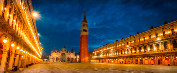 St. Mark’s Square (Piazza San Marco) Of Venice Without People And Illuminated Historic Buildings St. Mark's Square